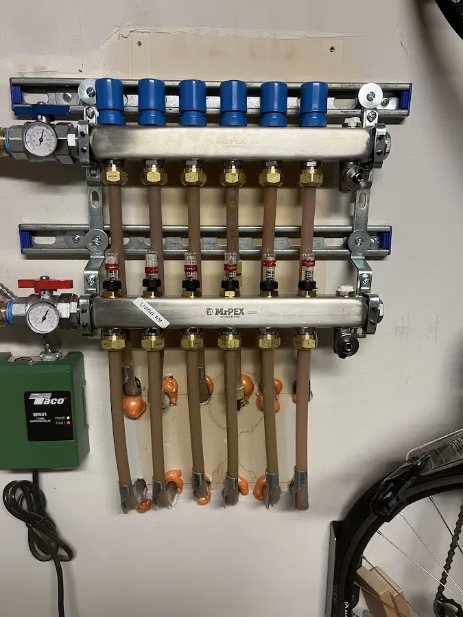 Plumber performing Water Heater Repair at a residential property in South Boston